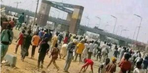 Youths Stone Buhari
