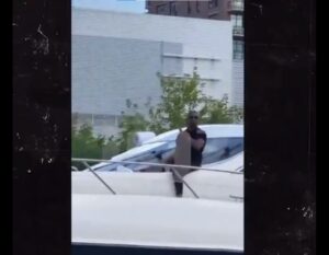 Videos: Jamie Foxx looks healthy as he was spotted waving to fans from a boat