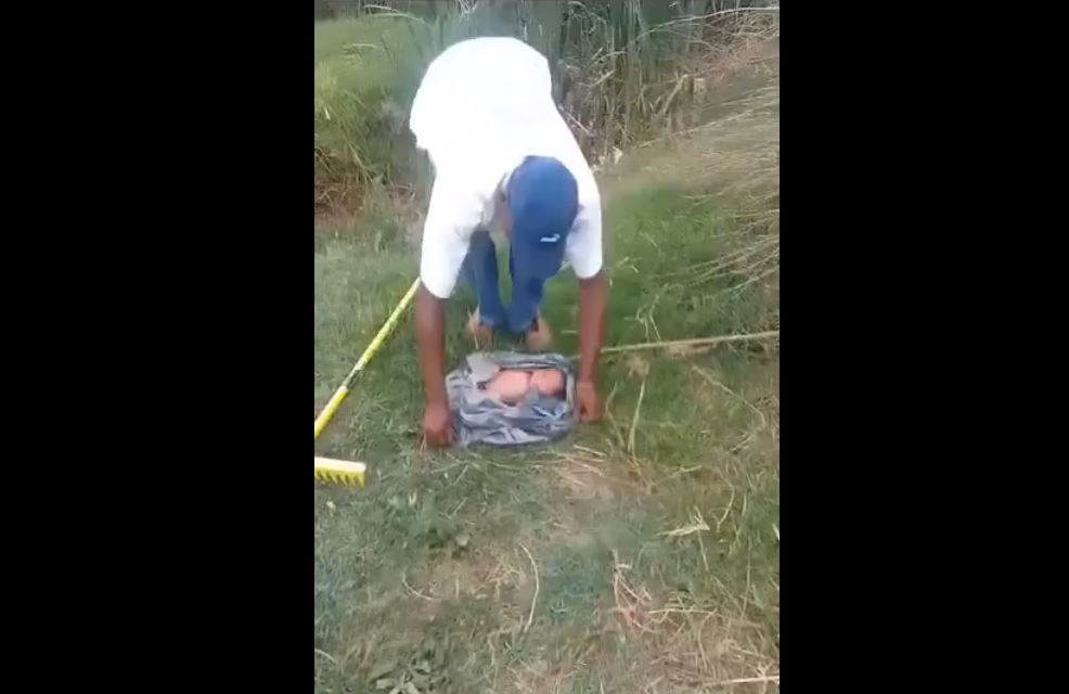 Video: New Born Baby Rescued In River After been dumped by Mother